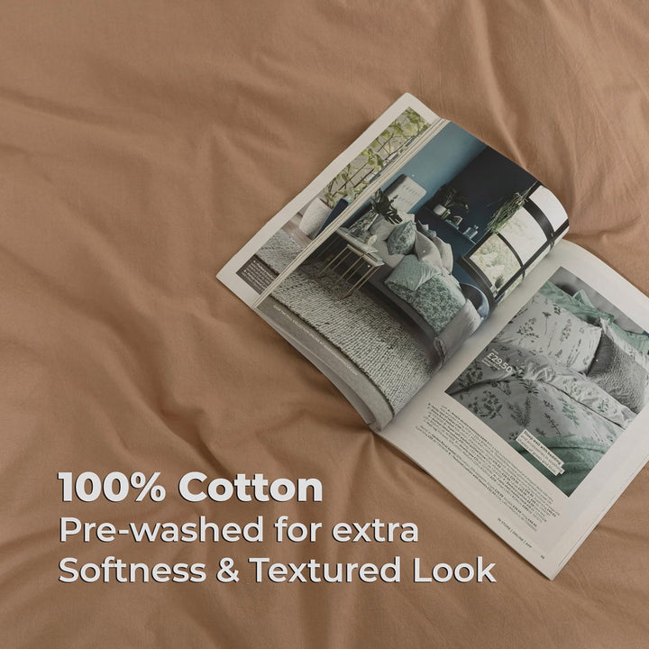 Brown 100% washed cotton duvet cover on a bed