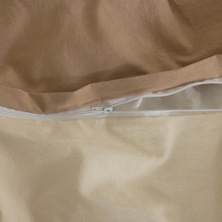 Zipper closure on a brown duvet cover